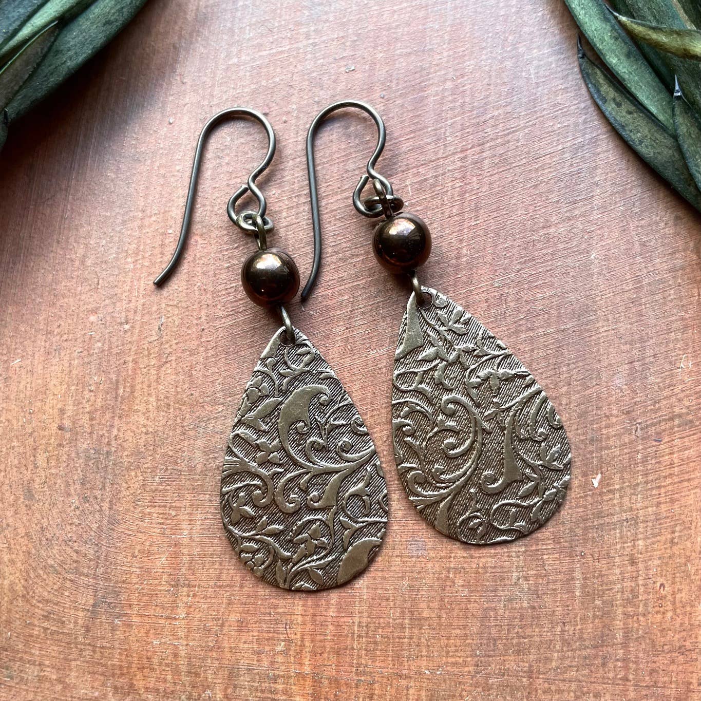 Bohemian Earrings - Bronze Glass Bead and Embossed Pendant
